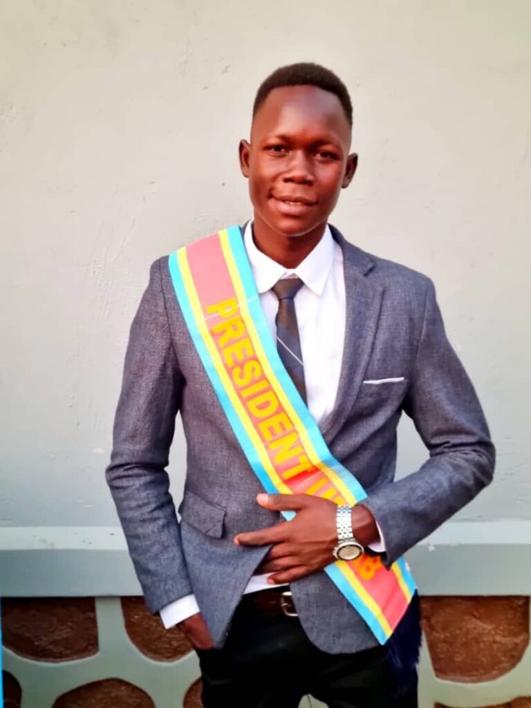 img-20250328-wa00246905344235202716228-768x1024 Bunia: le président de l'UEKAB, Cadeau Amule, rassure les étudiants sur la sortie académique "La Paix